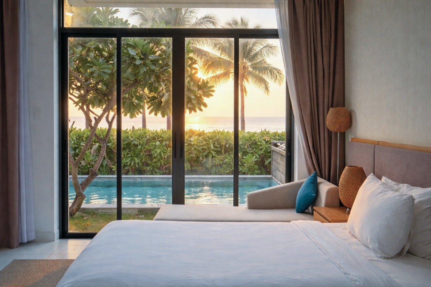 Bedroom with pool and sunrise view