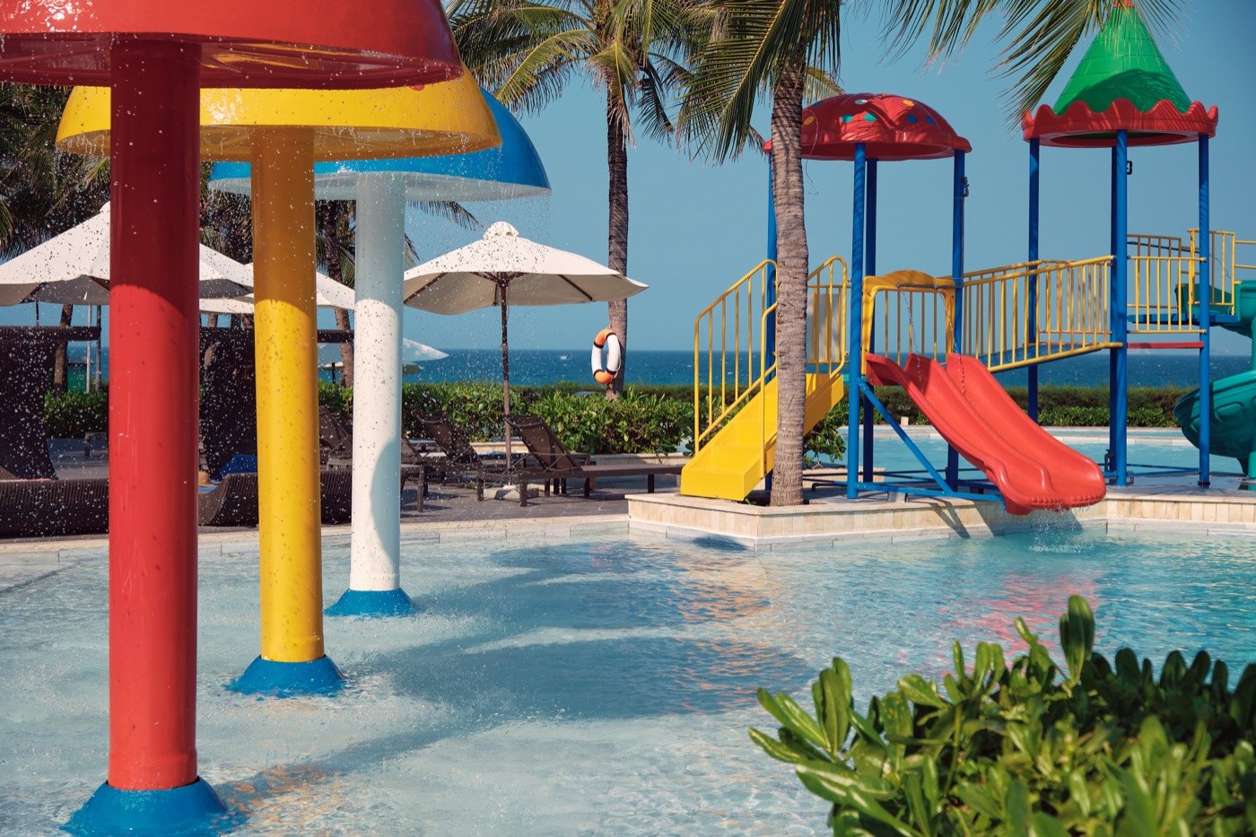 Children's water park with slides and fountains