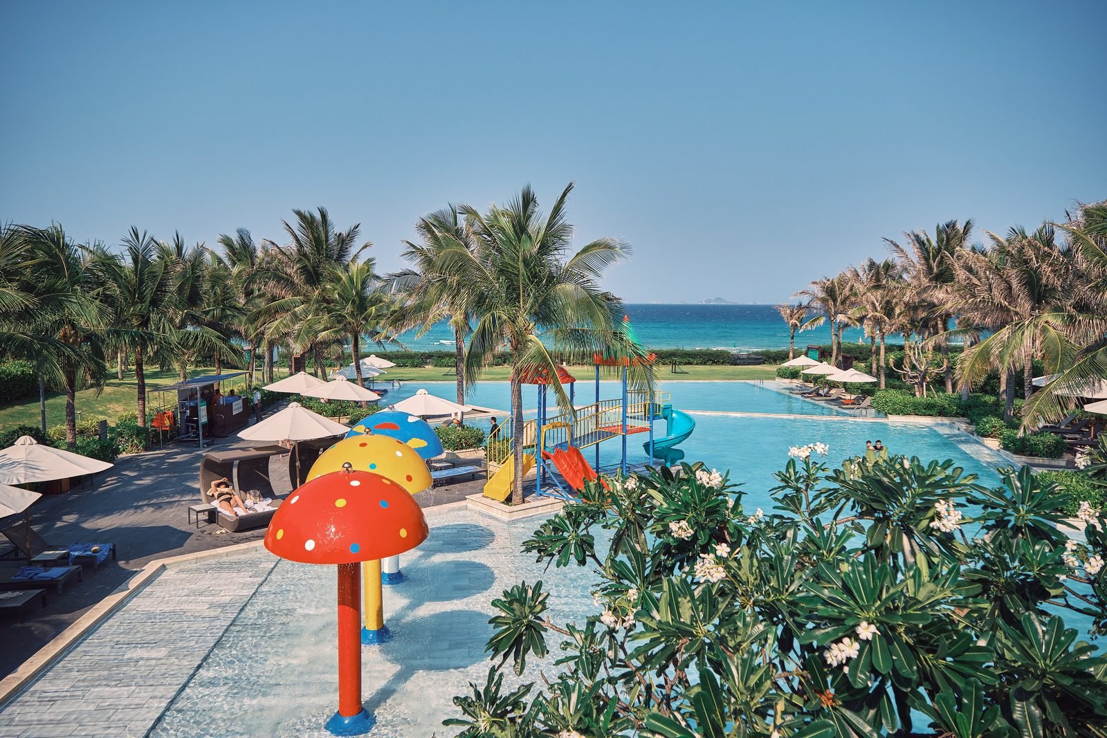 Main pool with palms and ocean view