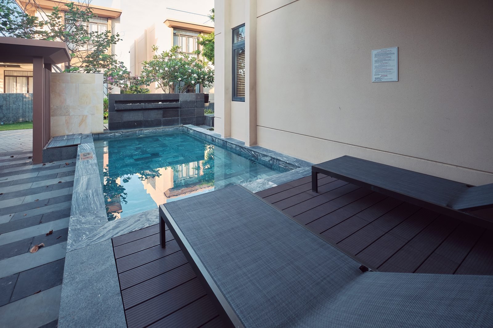Private plunge pool and terrace at dusk